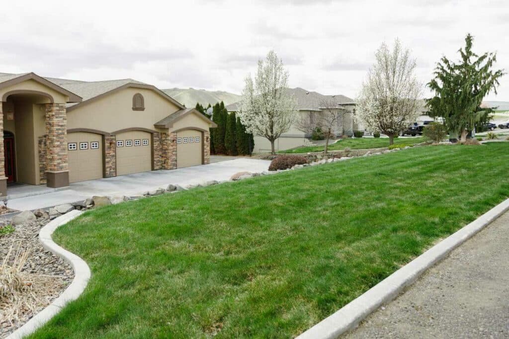 a well-maintained lawn Colonial Lawn and Garden