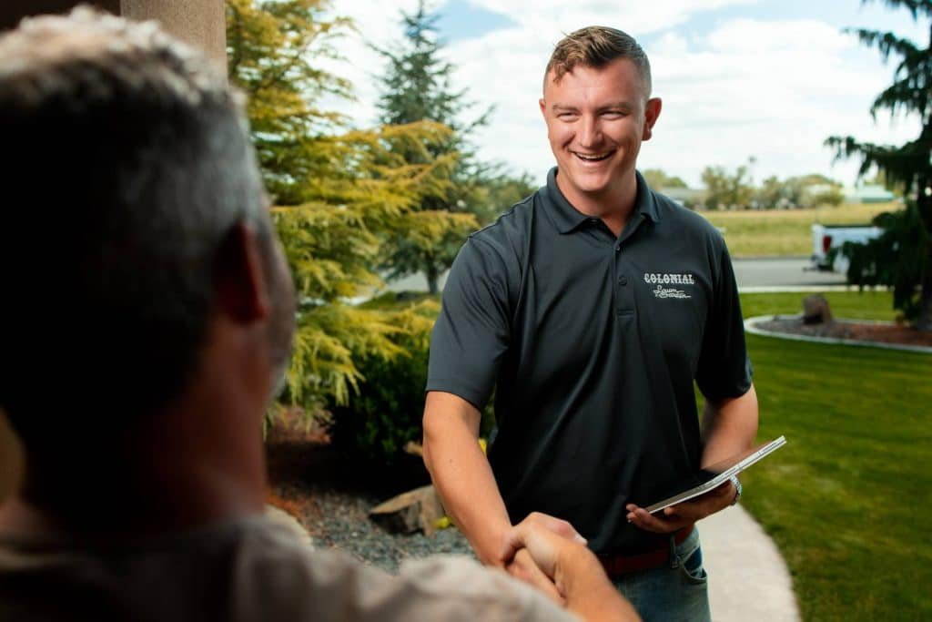 Colonial Lawn & Garden handshake with client in Richland